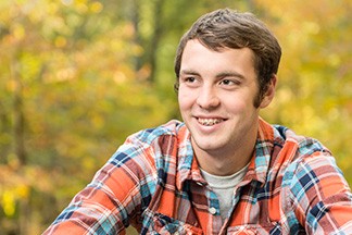 Boy with braces smiling