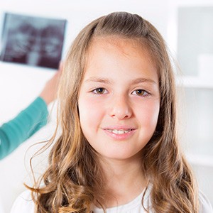 Girl with braces smiling